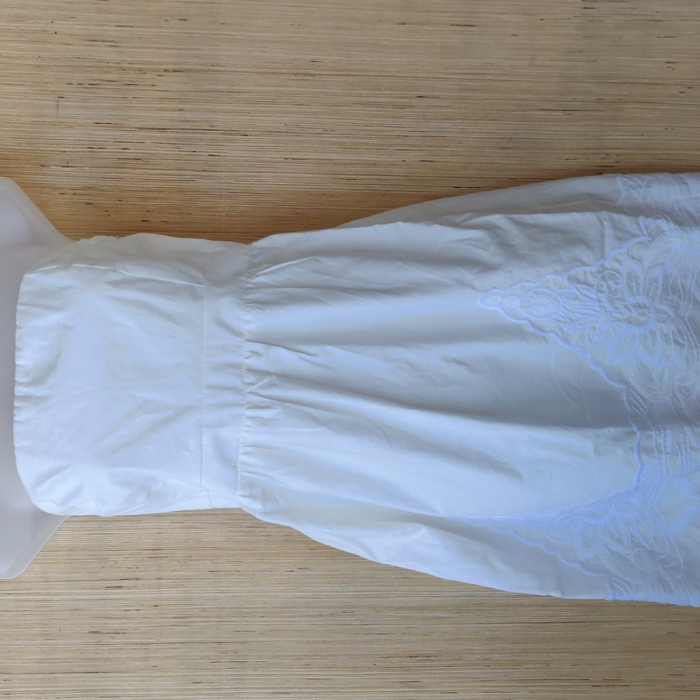 White trapless dress with embroidery